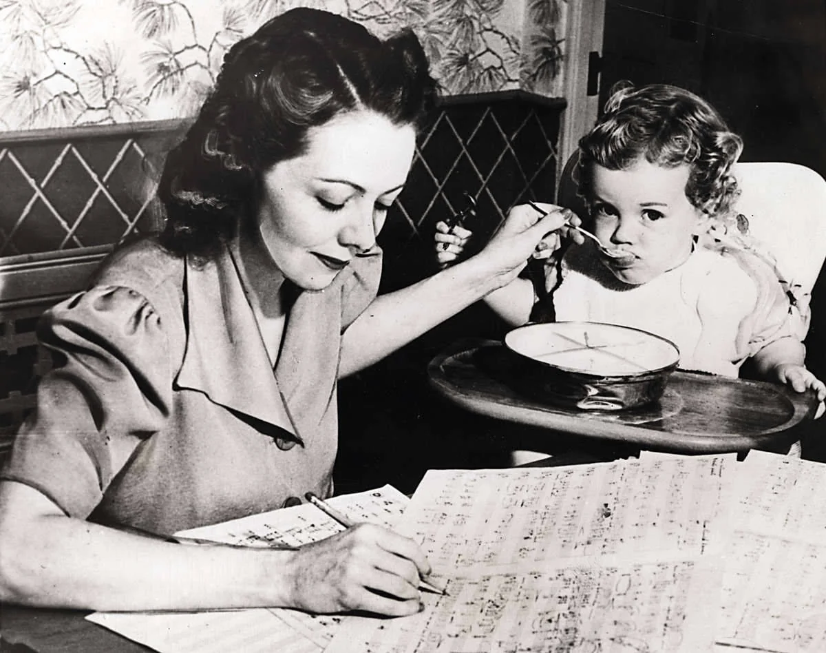 Elinor Remick Warren multitasking.